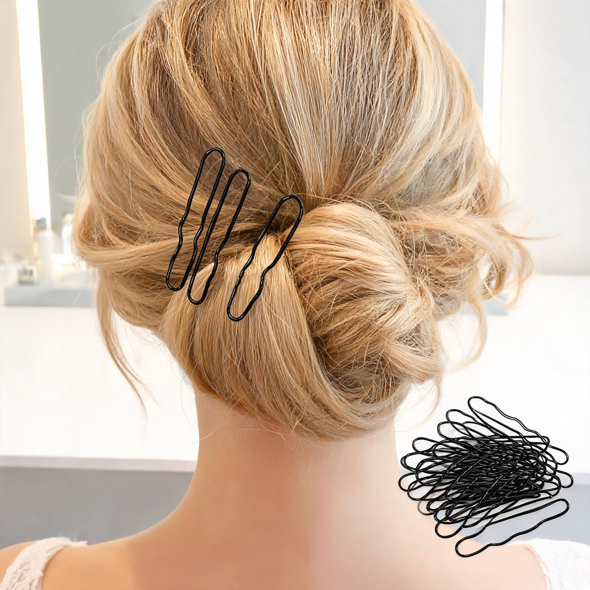 U-shaped wavy hair pins securing a bridal updo